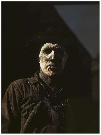 worker-at-carbon-black-plant-sunray-texas-1942-john-vachon.jpg