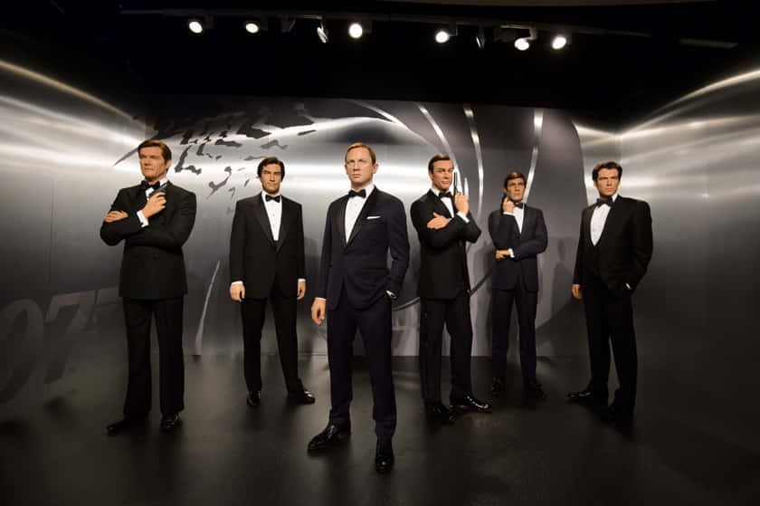 Mandatory Credit: Photo by Jonathan Hordle/REX/Shutterstock (5254361a) James Bond wax figures - Roger Moore, Timothy Dalton, Daniel Craig, Sean Connery, George Lazenby and Pierce Brosnan James Bond wax figures unveiled at Madame Tussauds, London, Britain - 15 Oct 2015 Madame Tussauds London today revealed wax figures of ALL SIX James Bonds, with five completely new wax 007s joining the existing figure of Daniel Craig. To coincide with the release of SPECTRE, the line up of Sean Connery, George Lazenby, Roger Moore, Timothy Dalton, Pierce Brosnan and Daniel Craig will appear at the Legendary London attraction for SIX WEEKS ONLY, before embarking on a tour of Madame Tussauds locations worldwide on December 1.