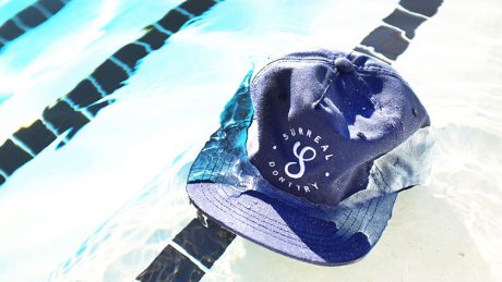 For a long and short summer, how about some new headwear & clothing from Surreal?