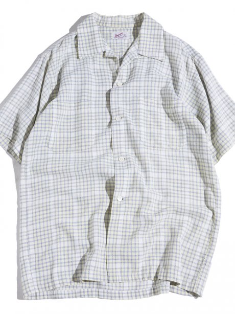 A light white collared shirt is just right for such indistinct weather.