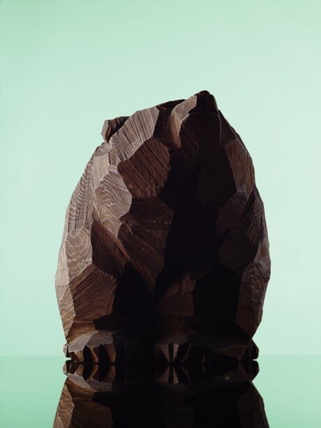 Salmon may or may not be nipped , . Various carved wooden bears gather at Kraska.