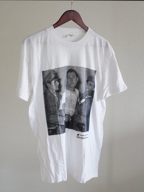 The smug, goofy face is impressive! Deadstock printed T-shirts are in stock now.