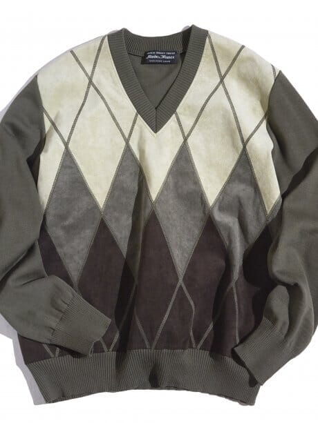 A V-neck knit with an argyle pattern that has a nice little bit of a bad look.