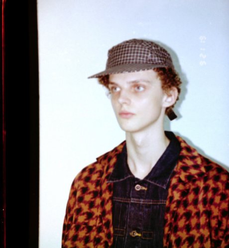 A cap co-created by Wonderland and Comfortably Reason. . "This for now" will be fulfilled.