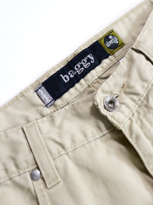 I wore baggy pants with silver tabs!