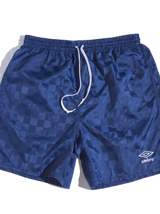 90's Umbro nylon shorts that are perfect for rainy days and tropical nights.