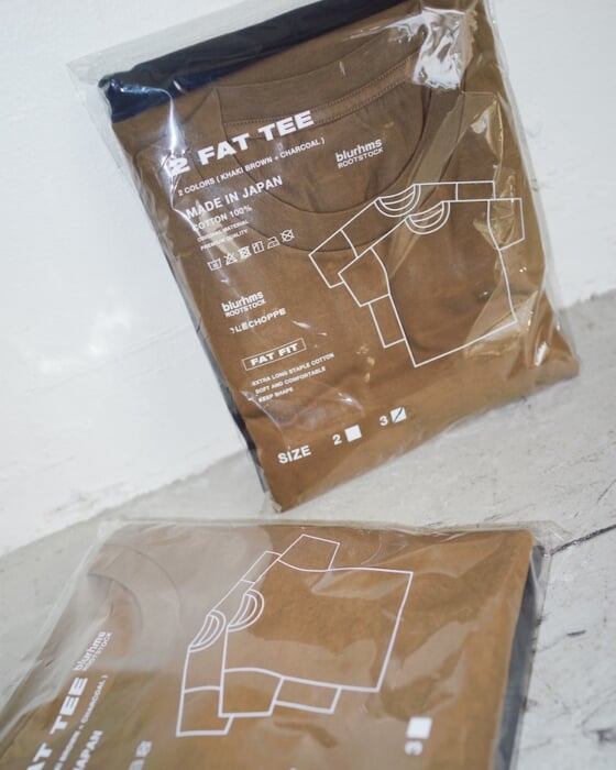 Blurhms Lutzstock and Reshop, who take a stoic approach to clothing, have created a supreme pack T for sale.