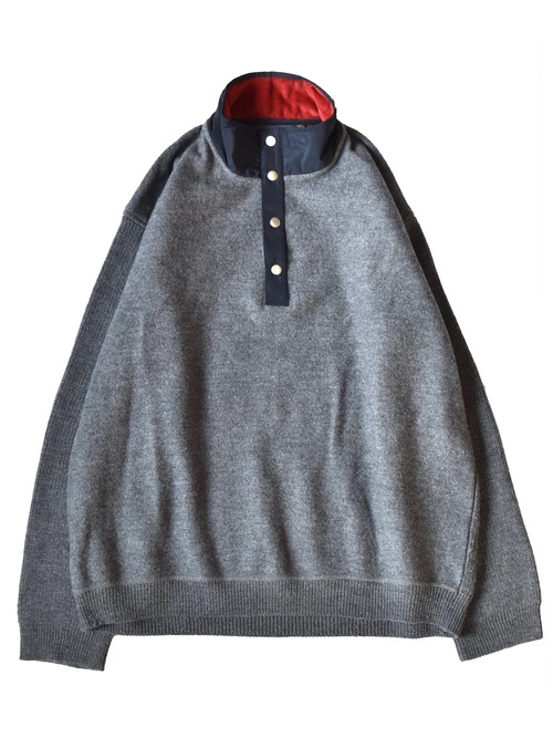 Half-snap knit like fleece. What a surprise, it comes with elbow patches.