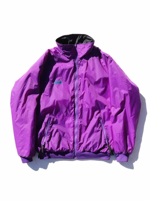 Columbia's reversible jacket with a 90's outdoor feel in the colorful purple color.