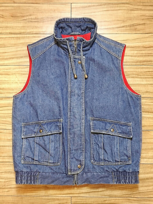 Rare denim down vest by Eddie Bauer, a renowned down manufacturer.