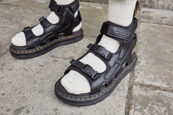 Dr. Martens has reworked the classic Swicock model. The collaborative sandals look great on the street.