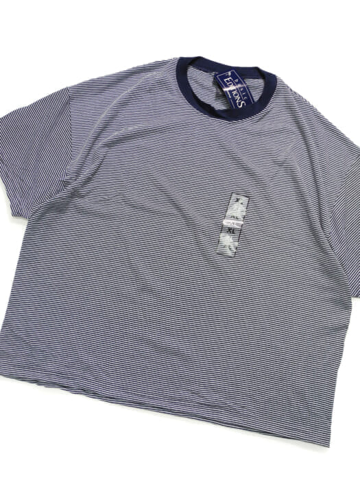 This 90s-inspired border tee is perfect as a single piece.