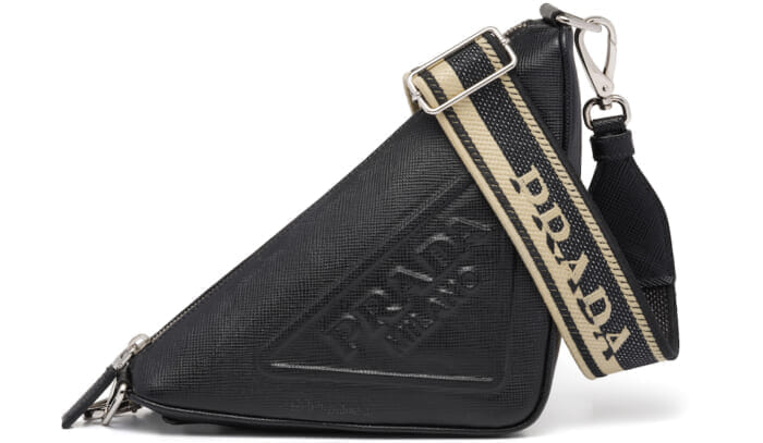The iconic triangle logo is now available in a bag. The Prada Triangle is now available.