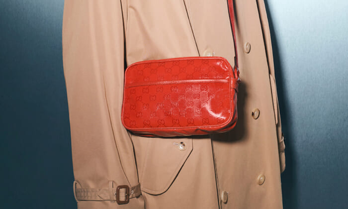 Gucci's GG pattern in hibiscus red. The new collection is a perfect addition to your summer look.