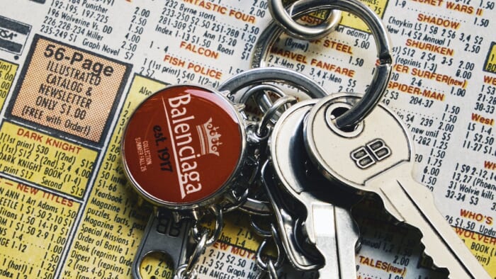 Serialized "The Best of the Best" No.414 A Balenciaga key ring that looks like a toy box.